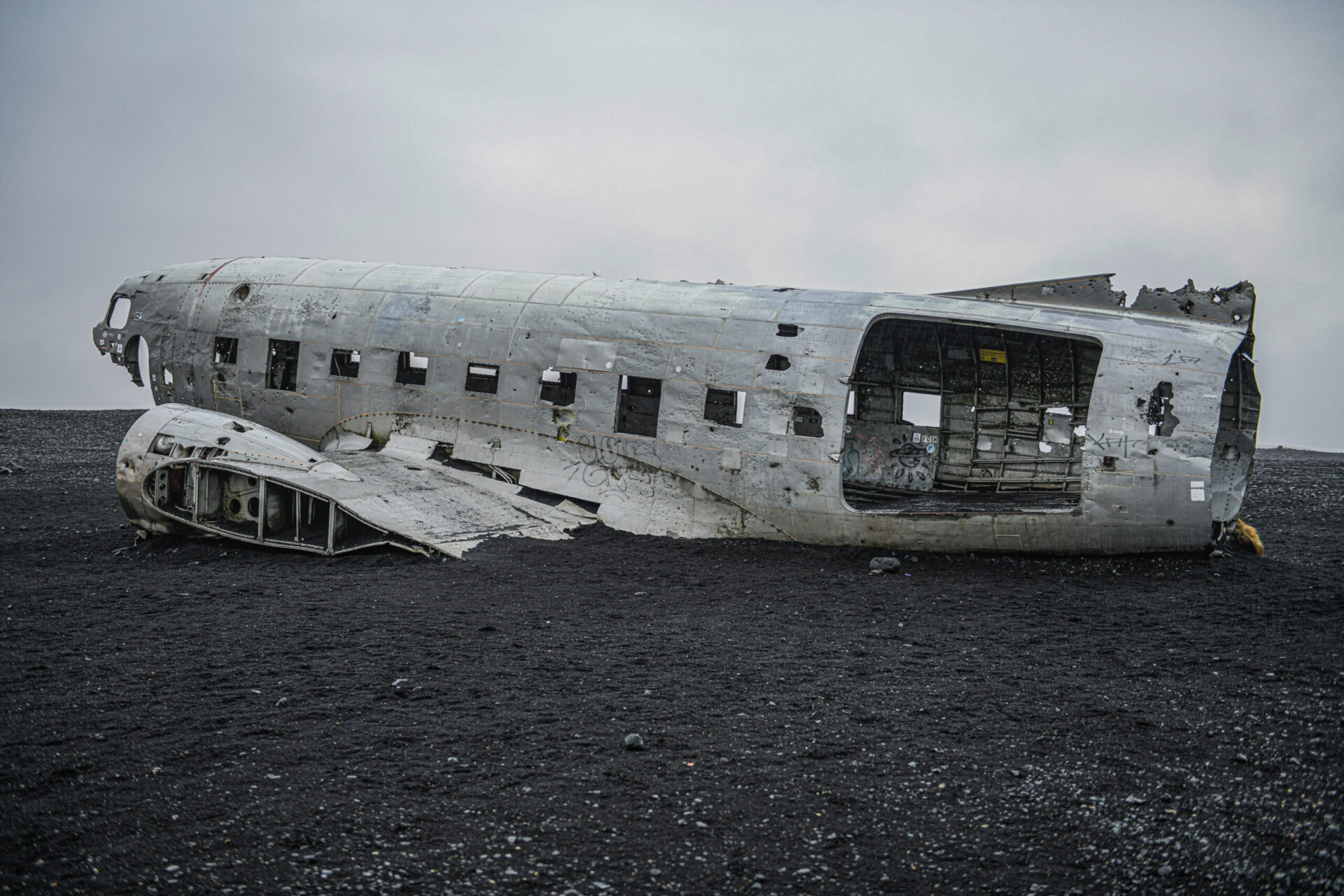 Amid the stark, otherworldly landscape of Sólheimasandur, Iceland, the abandoned plane wreck stands as a haunting reminder of human impact on nature. Lizane Louw captures the eerie beauty of this scene, where the remnants of human activity starkly contrast with the raw, untamed environment. The juxtaposition of rusted metal against the black sand beach evokes a sense of mystery and contemplation about our relationship with the natural world.