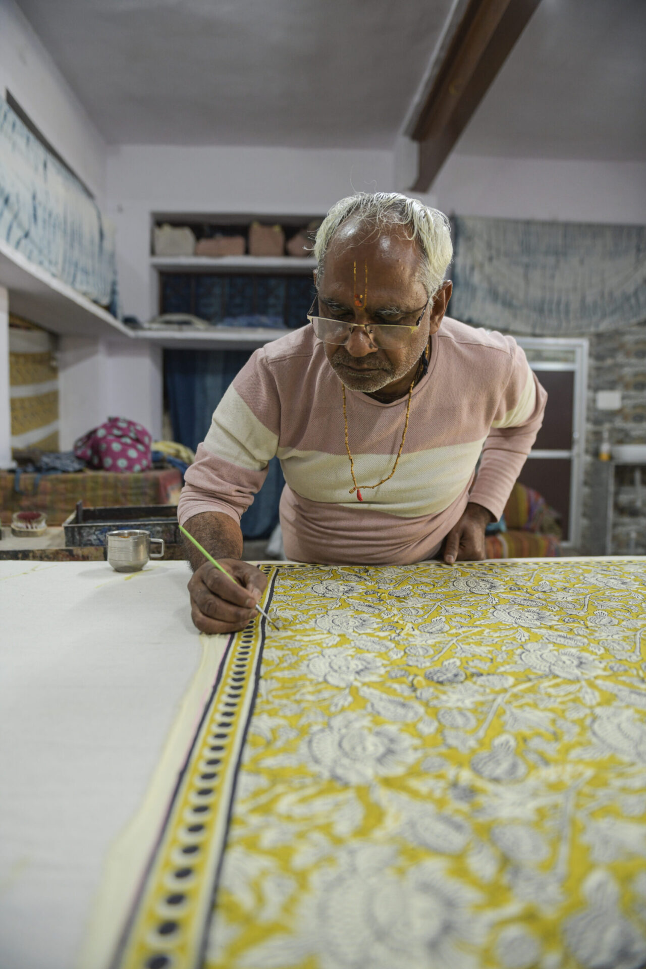 A cup of masala chai with a block print master. I spent days at Mud and Water’s studios in Bagru with master printer Digamber Medatwal and his three sons. I can write a book about the knowledge these master craftsmen transferred in our workshops. You know when you are in the presence of a master. Photo Lizane Louw